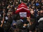 Israel strikes Gaza as an American activist killed by Israeli fire is buried