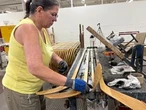 Canada’s last hockey stick factory survives in face of tariff threats, globalization