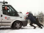 Heavy snow in northern England causes havoc on highways, knocks out power