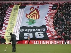 The UK apologizes to families of 97 Liverpool soccer fans killed after a stadium crush 34 years ago