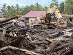 More bodies found in Indonesia after flash floods killed dozens and submerged homes