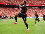 Why a Toronto billboard says three beers for Canadian World Cup star Jonathan David