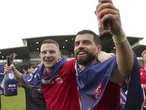 ’The ride of our lives’: Ryan Reynolds celebrates Wrexham's promotion to English soccer’s third division after 6-0 win