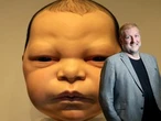Why is there a giant baby head on display in the National Gallery of Canada?