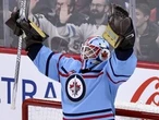 Laurent Brossoit's 42 saves backstop Jets to win