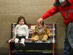 Gaudreau family visits first bench made from sticks from tribute to Johnny and Matthew