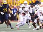 COLLEGE FOOTBALL FRENZY: Texas makes huge statement by toppling Michigan at Big House