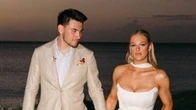 Canadiens' Nick Suzuki and his wife, Caitlin, share photos from magical wedding