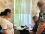 55-річну харків'янку підозрюють у коригуванні ворожих ракетних ударів по місту
