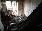 "Як ви? Краще, ніж під плитою". В обстріляному Харкові відкопали під завалом жінку. Відео