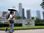 Singapore votes as city-state prepares to mark 60 years of independence