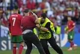 Cristiano Ronaldo ‘lucky' not to come to harm after he's confronted by selfie-seekers, coach says