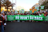 Thousands converge on Washington for a march days before Trump takes office