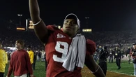 Ex-Alabama football player accused of wearing wigs to impersonate NFL players in loan fraud scheme