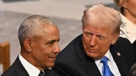 Trump posts doctored photo of Obamas and Air Force One with graffiti on plane