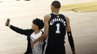 NBA bans fan for life after running onto court to attempt selfie with Wembanyama