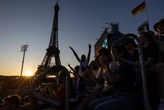 Beach volleyball at Eiffel Tower stadium draws the crowds looking for the perfect social media post