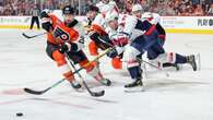 Oshie scores game-winner into empty net as Capitals make playoffs by beating Flyers