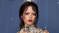 Jenna Ortega goes topless under just Givenchy jewel necklace at Emmys