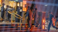 Coach of migrants run into 4-star hotel at night after protests outside