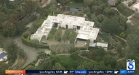 Intruder rams car through gates of Jennifer Aniston's pad while she's home
