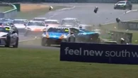 Race abandoned as crash leaves legend's son in hospital & car 'torn to pieces'