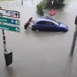 Spain swamped by floods as downpour leaves drivers trapped & streets underwater