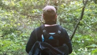 Eerie new pics of man wanted for questioning in murder of parents who saved girls