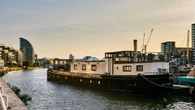 We transformed old barge into a floating home that's now worth a HUGE sum