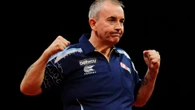 Taylor says darts ace will be 'hell of a player'.. once he gets over fan jeers