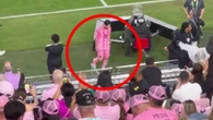 Lionel Messi storms straight down the tunnel as team-mates celebrate on pitch