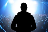 Boyband star is arrested for 'assaulting woman and child' as cops swoop on home