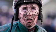 Jockey rushed to hospital and racing delayed after parade ring incident