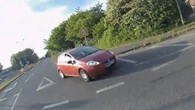 Moment cyclist is hit by car at roundabout - but who’s in the wrong?