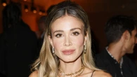 TV host Diletta Leotta stuns in low-cut leopard print dress at fashion week
