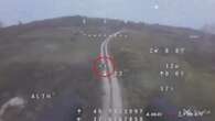 Moment Ukraine drone destroys 3 Russian UAVs before dropping grenade on enemy