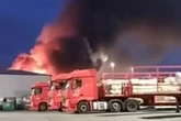 Moment blaze rips through recyling plant as locals urged to keep windows closed