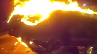 Horror moment car explodes in fireball as cops pull passenger out of wreck