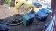 Shock moment Storage Hunters star drives CAR at neighbour in war over garden