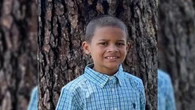 Parents arrested for letting boy, 7, walk home 'unattended' before he died