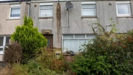 Neighbour's eyesore home has been rotting for years & makes street look bad