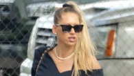 Rarely-seen tennis legend Anna Kournikova, 44, shows off growing baby bump