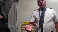 Shock moment ‘drunk’ pilot who ‘reeked of boozed’ is led from cockpit