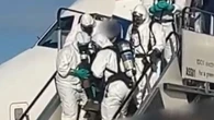 Moment hazmat firefighters storm BA flight over fears of ‘toxic leak’