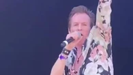 80s heartthrob looks unrecognisable as he performs with band - can you guess who?