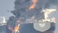 Moment flames leap from 'dark fleet' tanker after being 'hit by another boat'