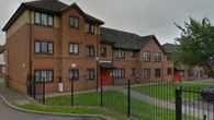 Man arrested on suspicion of murder after body of woman, 47, found in flat