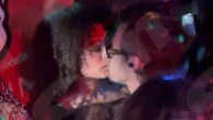 Watch Harry Styles passionately snog mystery woman at Glastonbury