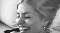 Holly Willoughby looks happier than ever as she poses in her bikini