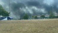 Blaze rips through Jaguar Land Rover factory filling sky with smoke